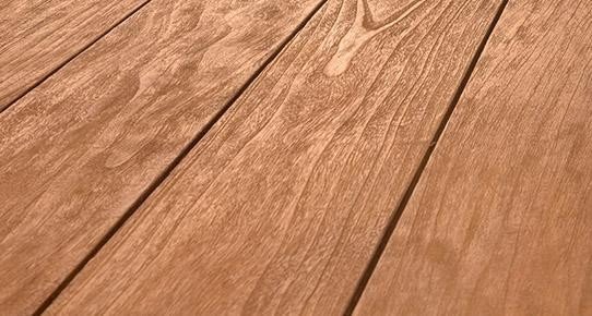 Lasierte Holzoberflächen-Übersicht: mehrere Holzproben mit Lasurtönen von hell bis dunkel, sichtbare Holzmaserung, Möbel & Innenausbau