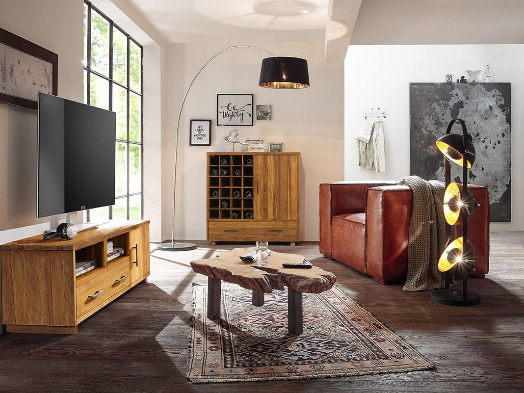 Moderner Clubsessel aus Leder in gemütlichem Wohnambiente, zeitloses Design und weiche Polsterung, ideal für Wohnzimmer